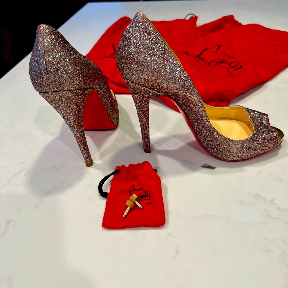 Christian Louboutin glitter, peep toe heels. Size 37.5. Excellent cond